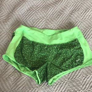 Green Nike dri-fit running shorts